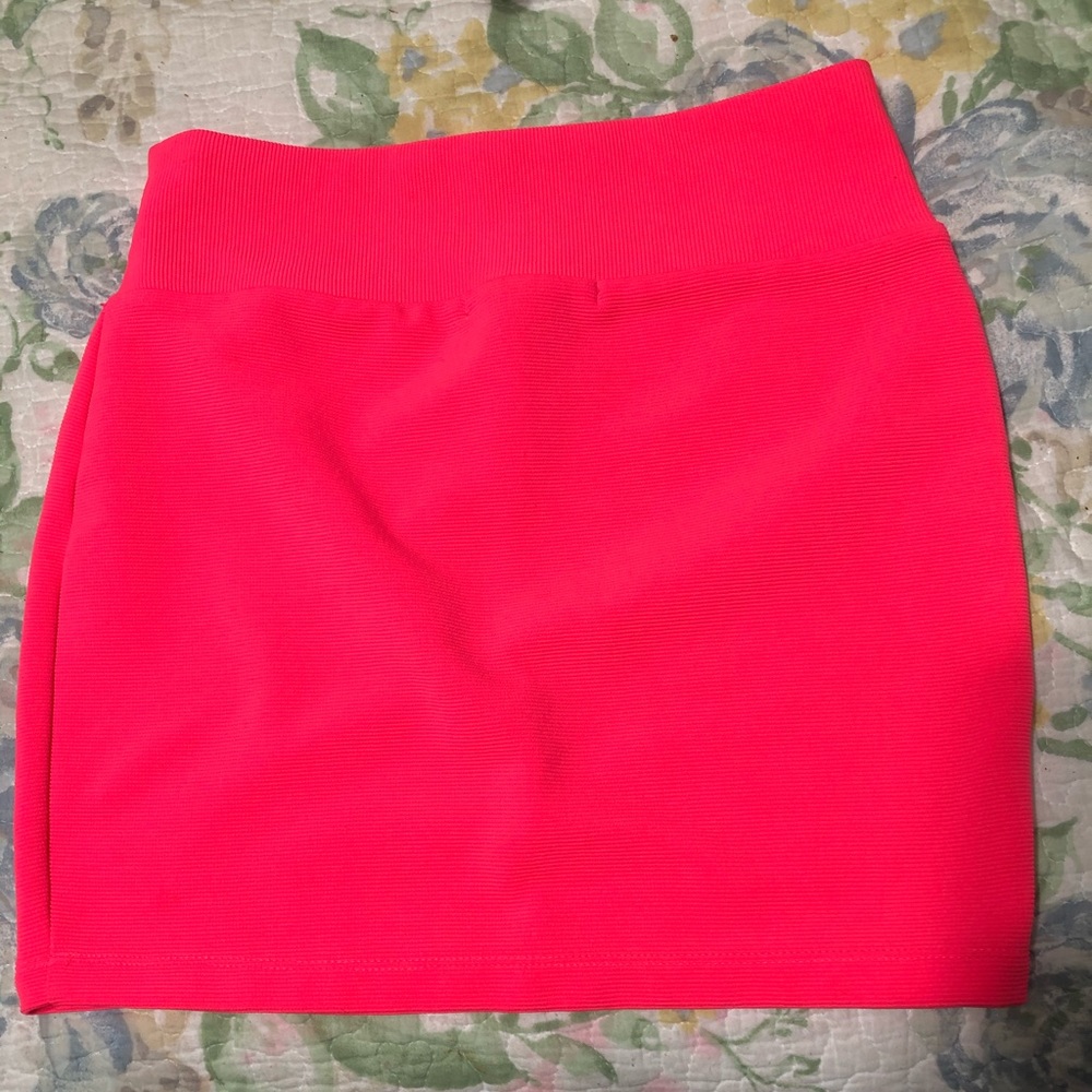 Neon pink mini skirt